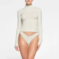 COTTON JERSEY LONG SLEEVE TURTLENECK |-Skims Online