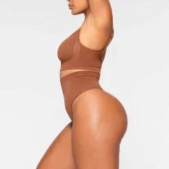 SEAMLESS SCULPT MID WAIST THONG |-Skims Clearance