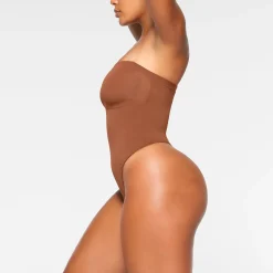 SEAMLESS SCULPT STRAPLESS THONG BODYSUIT |-Skims Discount
